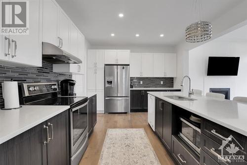 Tons of cabinetry and counter space. - 4527 Kelly Farm Drive, Ottawa, ON - Indoor Photo Showing Kitchen With Upgraded Kitchen