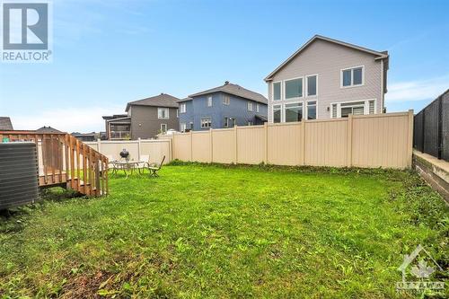 Fully fenced backyard with plenty of room to have outdoor living space. - 4527 Kelly Farm Drive, Ottawa, ON - Outdoor