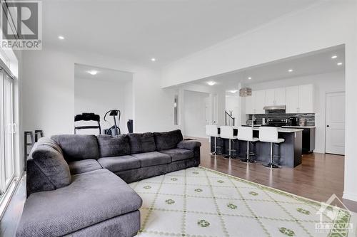 Spacious living room is great for gathering with family and friends. - 4527 Kelly Farm Drive, Ottawa, ON - Indoor Photo Showing Living Room