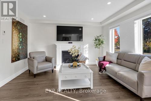 27 Muma Street, Blandford-Blenheim, ON - Indoor Photo Showing Living Room With Fireplace