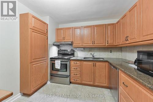 1201 - 2323 Confederation Parkway, Mississauga, ON - Indoor Photo Showing Kitchen With Double Sink