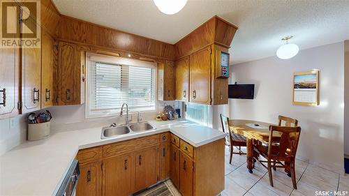 47 Minot Drive, Regina, SK - Indoor Photo Showing Kitchen With Double Sink