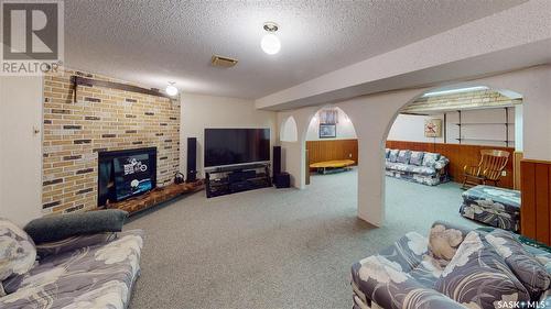 47 Minot Drive, Regina, SK - Indoor Photo Showing Living Room With Fireplace