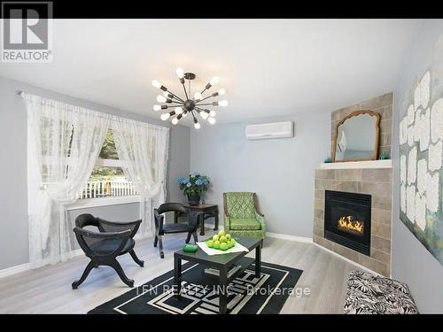 2829 25Th Side Road, Innisfil, ON - Indoor Photo Showing Living Room With Fireplace