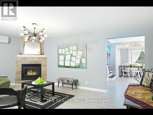 2829 25Th Side Road, Innisfil, ON - Indoor Photo Showing Living Room With Fireplace