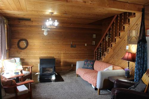 32 Birch Crescent, Grindstone Provincial Pk, MB - Indoor Photo Showing Living Room With Fireplace