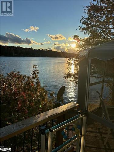 6PM looking west. 26OCT24 - Beside 94 Pine Point Trail, Trent Lakes, ON - Outdoor With Body Of Water With View