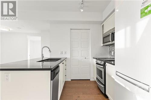 316 Bruyere Street Unit#317, Ottawa, ON - Indoor Photo Showing Kitchen With Stainless Steel Kitchen With Double Sink With Upgraded Kitchen