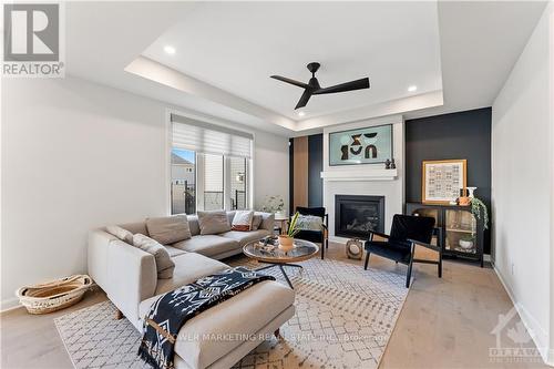 1025 Jubilation Court, Ottawa, ON - Indoor Photo Showing Living Room With Fireplace