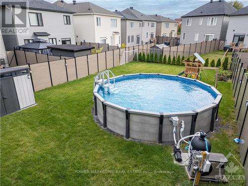 1025 Jubilation Court, Ottawa, ON - Outdoor With Above Ground Pool With Backyard