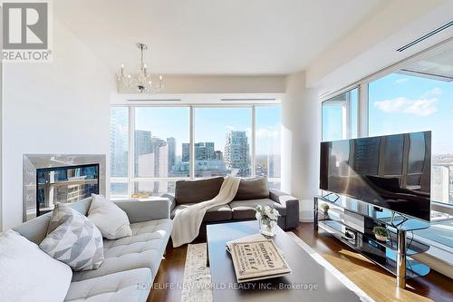 3805 - 180 University Avenue, Toronto, ON - Indoor Photo Showing Living Room With Fireplace