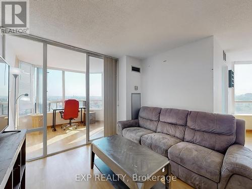 1210 - 350 Alton Towers Circle, Toronto, ON - Indoor Photo Showing Living Room