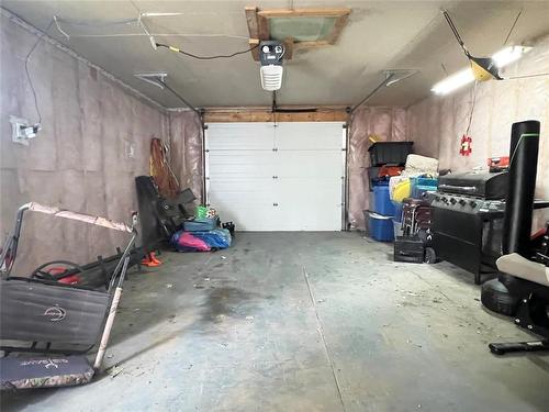 214 6Th Avenue Ne, Portage La Prairie, MB - Indoor Photo Showing Garage