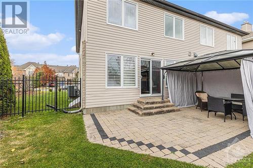 Backyard interlock patio with gazebo! - 4220 Kelly Farm Drive, Ottawa, ON - Outdoor