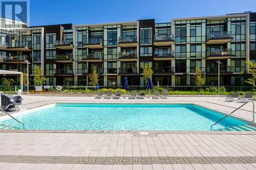 217 - 415 Sea Ray Avenue, Innisfil, ON - Outdoor With In Ground Pool With Balcony