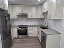 Kitchen - 9718 Boul. Olympia, Montréal (Ahuntsic-Cartierville), QC  - Indoor Photo Showing Kitchen With Double Sink With Upgraded Kitchen 