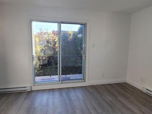 Living room - 9718 Boul. Olympia, Montréal (Ahuntsic-Cartierville), QC - Indoor Photo Showing Other Room