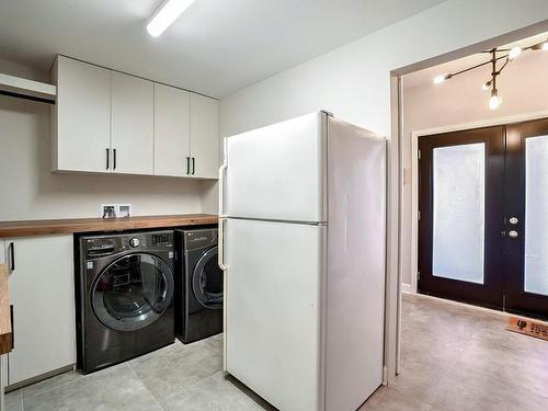 Salle de lavage - 71 413E Avenue, Saint-Hippolyte, QC - Indoor Photo Showing Laundry Room