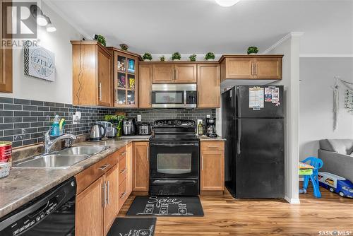 701 110 Shillington Crescent, Saskatoon, SK - Indoor Photo Showing Kitchen With Double Sink