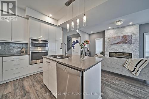 291 Morgan Street, Cobourg, ON - Indoor Photo Showing Kitchen With Fireplace With Double Sink With Upgraded Kitchen