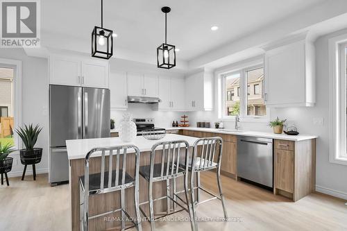 123 - 93 Stonefield Lane, Middlesex Centre (Ilderton), ON - Indoor Photo Showing Kitchen With Upgraded Kitchen