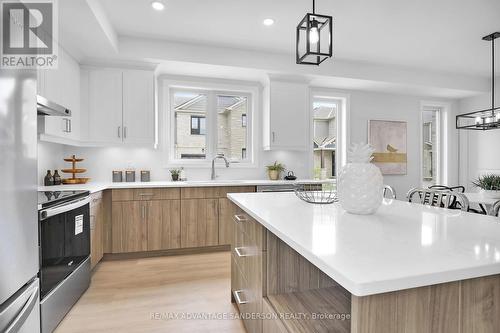 123 - 93 Stonefield Lane, Middlesex Centre (Ilderton), ON - Indoor Photo Showing Kitchen With Upgraded Kitchen