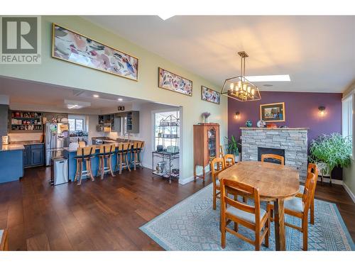 6521 Bellevue Drive, Oliver, BC - Indoor Photo Showing Dining Room With Fireplace