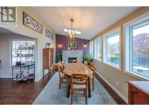 6521 Bellevue Drive, Oliver, BC - Indoor Photo Showing Dining Room With Fireplace