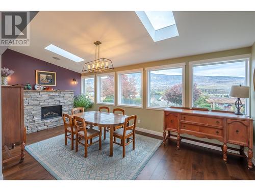 6521 Bellevue Drive, Oliver, BC - Indoor Photo Showing Dining Room With Fireplace