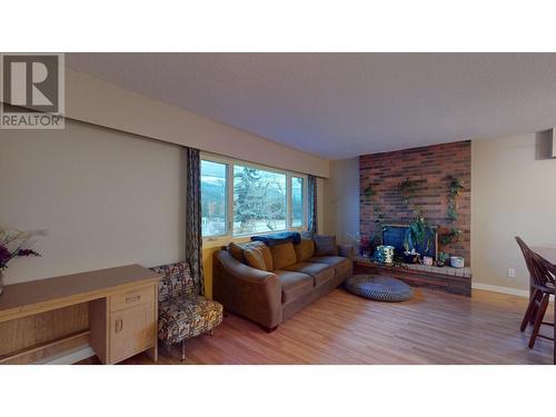 751 Fording Drive, Elkford, BC - Indoor Photo Showing Living Room With Fireplace