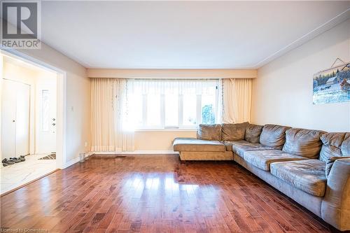 Living room featuring dark hardwood / wood-style flooring - 580 Highpoint Avenue Unit# Upper, Waterloo, ON - Indoor Photo Showing Living Room