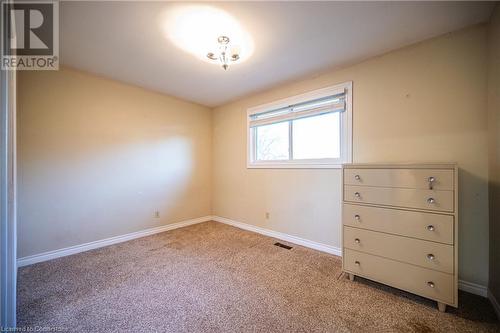 Unfurnished room featuring carpet - 580 Highpoint Avenue Unit# Upper, Waterloo, ON - Indoor Photo Showing Other Room