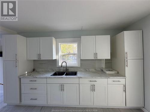 1716 Jefferson, Windsor, ON - Indoor Photo Showing Kitchen With Double Sink