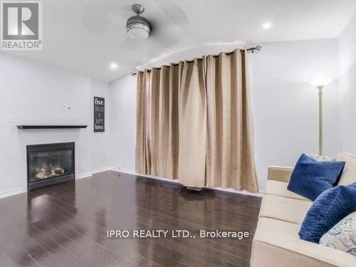 154 Mccready Drive, Milton, ON - Indoor Photo Showing Living Room With Fireplace