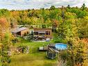 Back facade - 110 Rue Guillaume, Magog, QC  - Outdoor With Above Ground Pool 