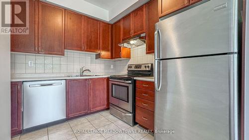 309 - 5705 Long Valley Road, Mississauga, ON - Indoor Photo Showing Kitchen With Double Sink