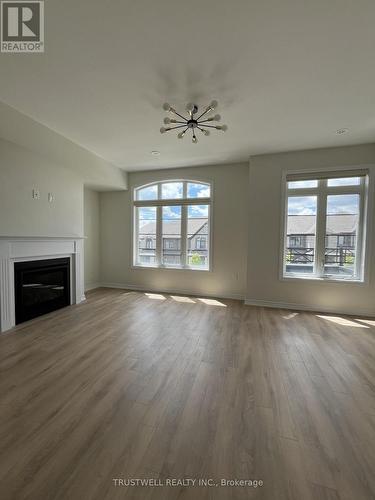 23 Verbena Street, East Gwillimbury, ON - Indoor Photo Showing Living Room With Fireplace