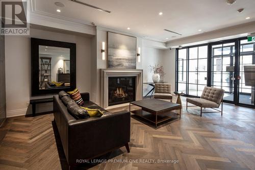 105 - 571 Prince Edward Drive N, Toronto, ON - Indoor Photo Showing Living Room With Fireplace