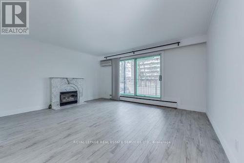 1St Fl - 18 Long Branch Avenue, Toronto, ON - Indoor With Fireplace