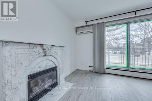 1St Fl - 18 Long Branch Avenue, Toronto, ON - Indoor With Fireplace