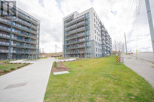 407 - 1098 Paisley Road, Guelph, ON - Outdoor With Facade