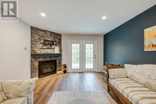 41 Jackson Court, Tillsonburg, ON - Indoor Photo Showing Living Room With Fireplace