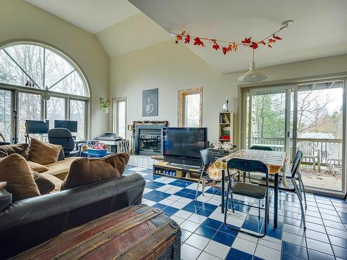 Vue d'ensemble - 3710 Rue De L'Aubergiste, Sainte-Adèle, QC - Indoor Photo Showing Living Room With Fireplace