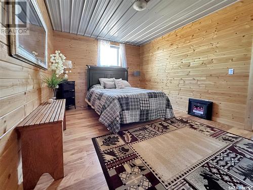 The French Ranch, Brock Rm No. 64, SK - Indoor Photo Showing Bedroom With Fireplace