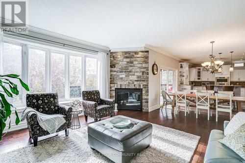 49 Heatherwood Drive, Springwater, ON - Indoor Photo Showing Living Room With Fireplace