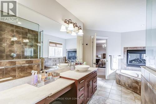 49 Heatherwood Drive, Springwater, ON - Indoor Photo Showing Bathroom With Fireplace