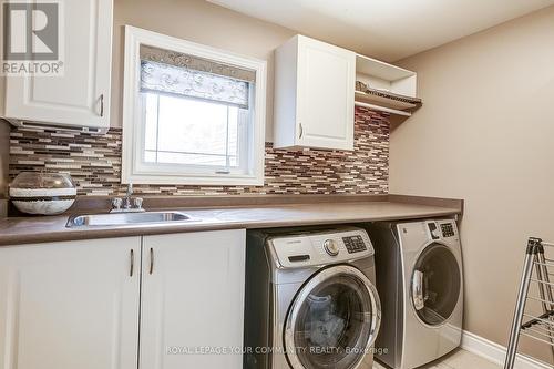 49 Heatherwood Drive, Springwater, ON - Indoor Photo Showing Laundry Room