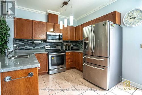 18 Fiddlehead Terrace, Toronto, ON - Indoor Photo Showing Kitchen With Double Sink