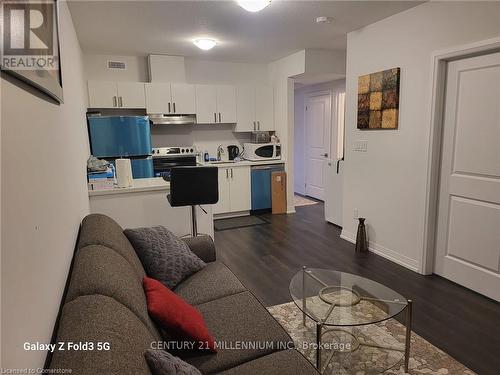 100 - 6705 Cropp Street, Niagara Falls, ON - Indoor Photo Showing Kitchen