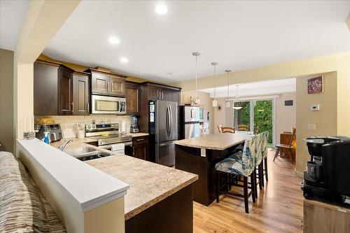 127-440 Hartman Road, Kelowna, BC - Indoor Photo Showing Kitchen With Stainless Steel Kitchen With Double Sink With Upgraded Kitchen